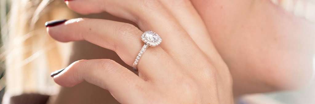 Accented halo engagement ring