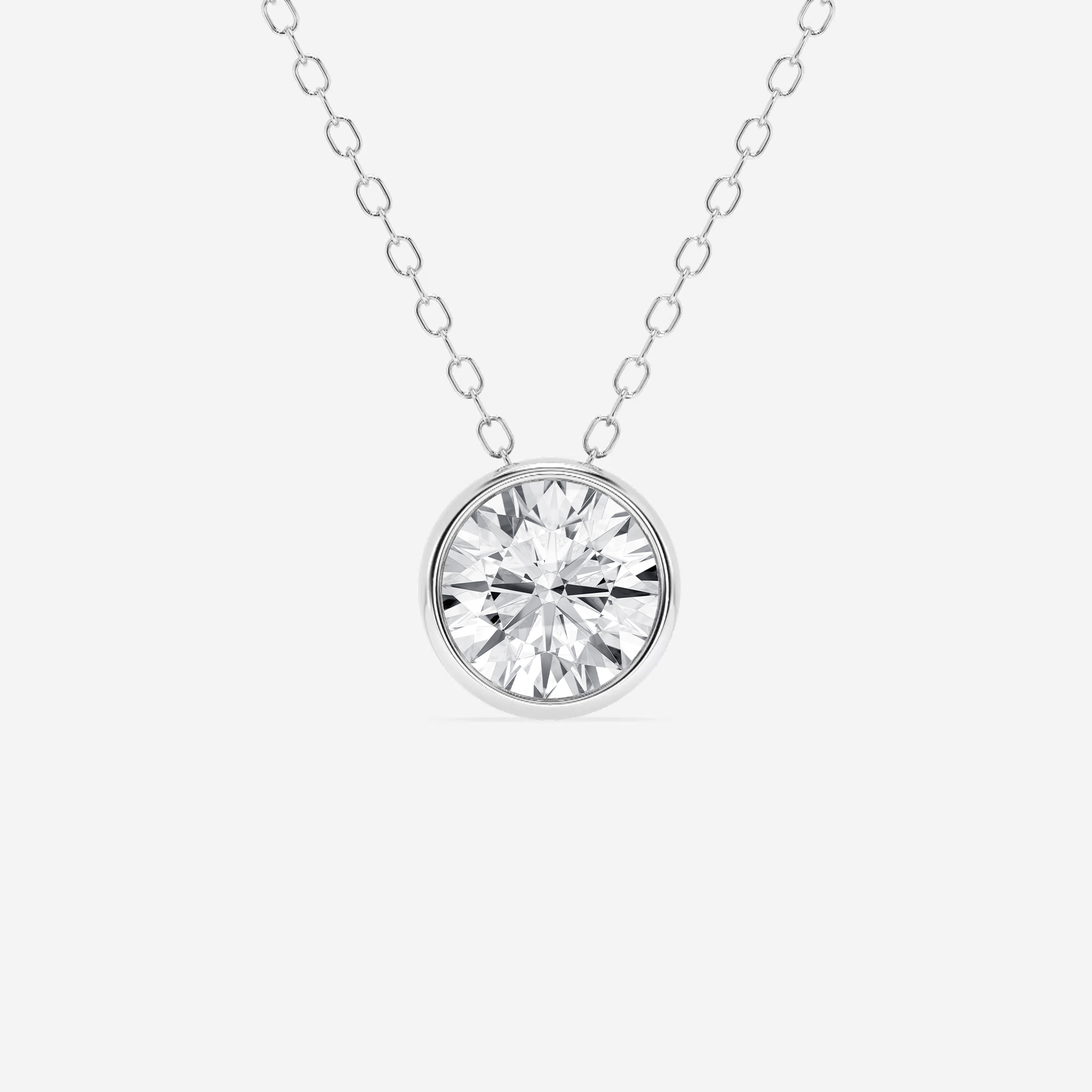 3/4 ct.tw. Round Diamond Bezel Set Solitaire Pendant with Adjustable Chain in 14K Gold